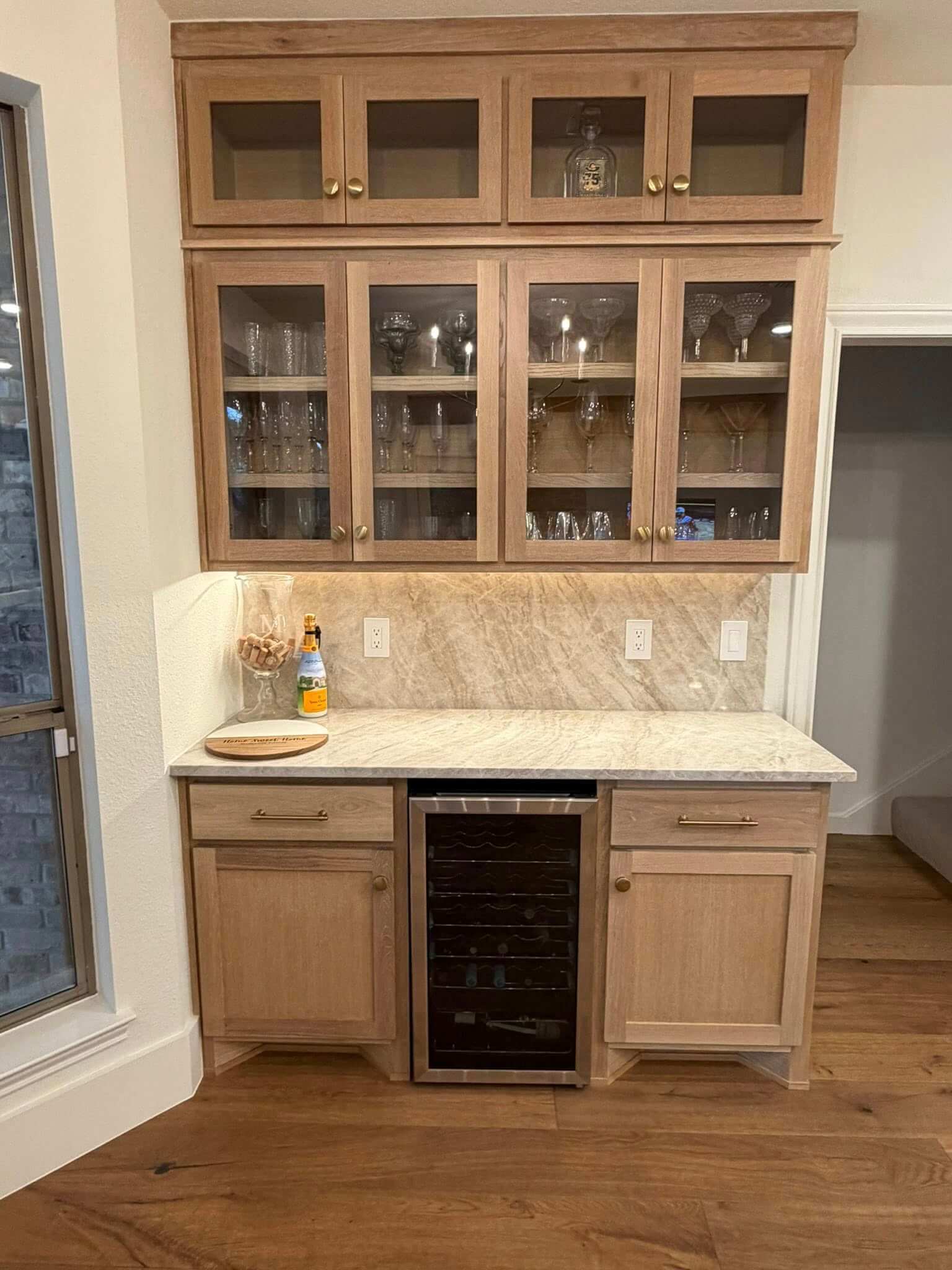 oak cabinets with glass doors in Fair Oaks Ranch TX kitchen remodel by Shaw Construction Services